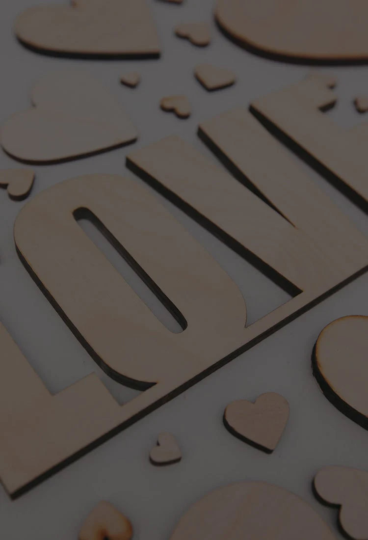 A "love" laser cut label from a laserply hobbyist using Australian plywood supplier Plyco's 12mm Birch Laserply