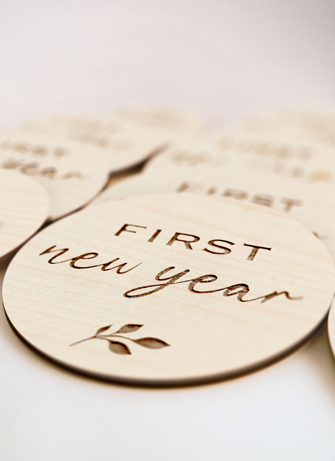 Laser cutting and engraving project using Melbourne plywood supplier Plyco's 3mm Canadian Rock Maple Legnoply Pack on a white background