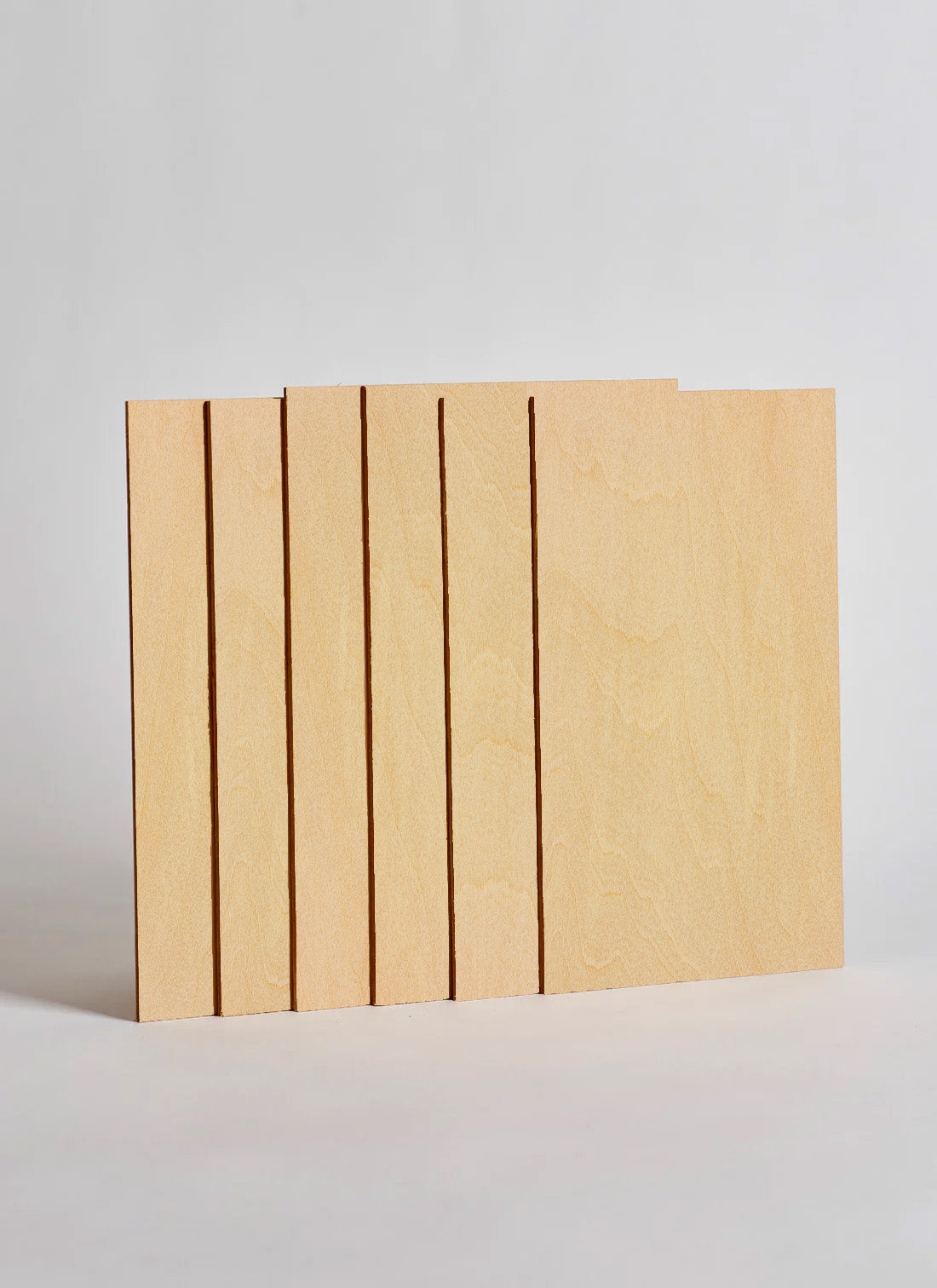 Plyco's 3mm Basswood Laserply Craft Pack, containing six sheets, on a white background